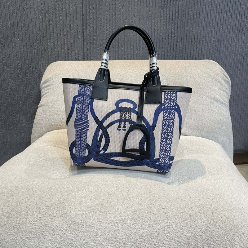 H**mes shopping bags